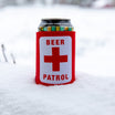 Can cooler with 'Beer Patrol' label in the snow